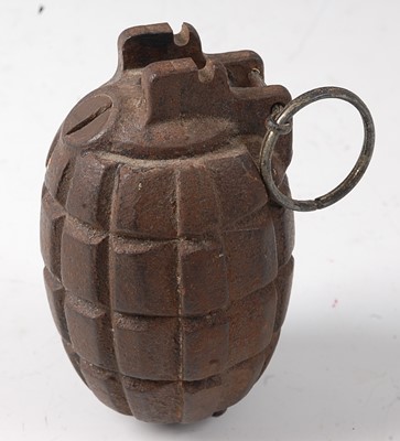 Lot 113 - A Mills No. 23 Mk II hand grenade, the base...