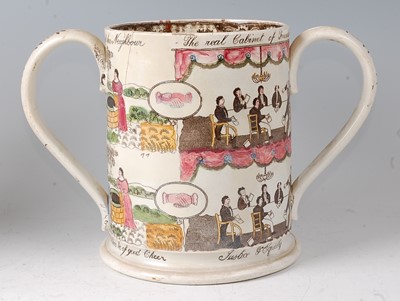 Lot 2062 - A 19th century Staffordshire loving cup,...