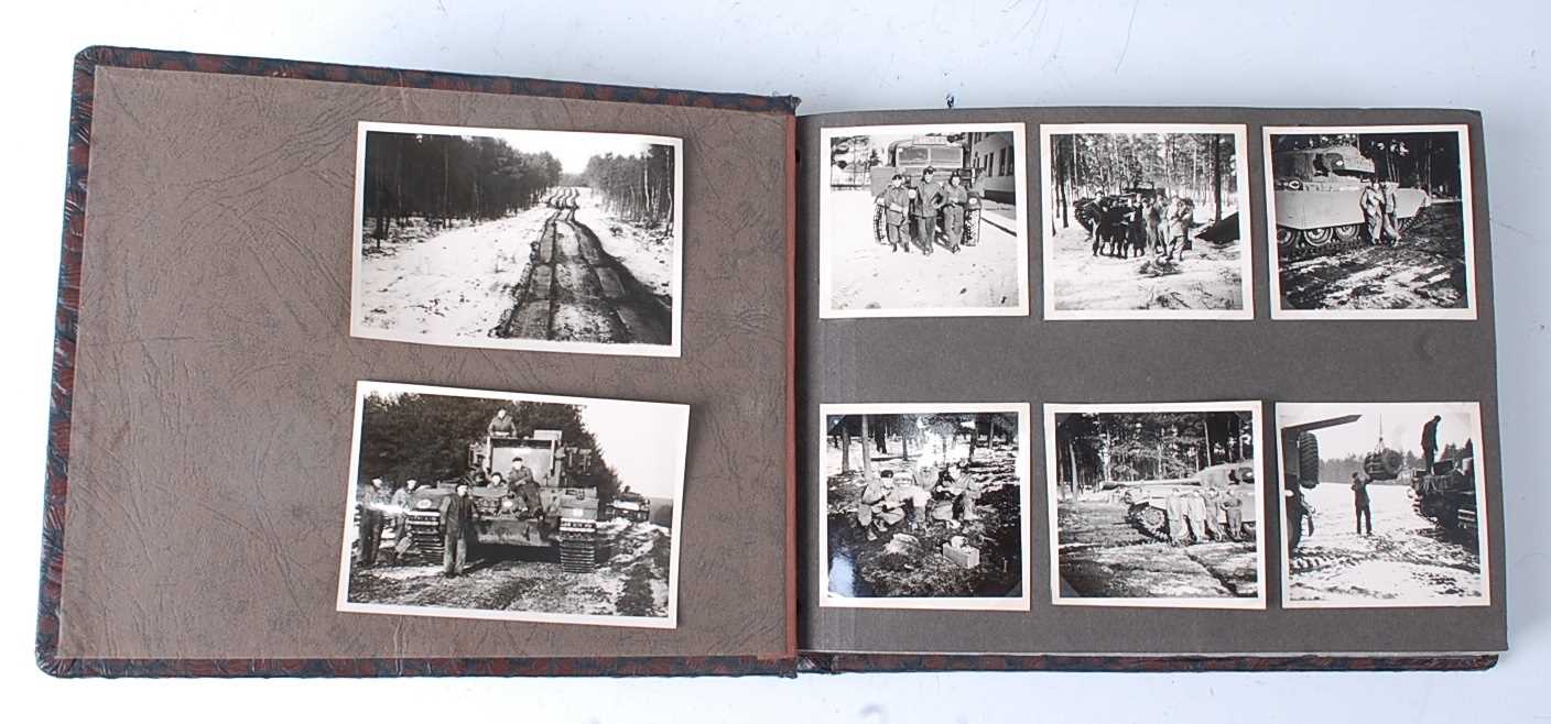 Lot 70 - A post WW II photograph album, the black and...
