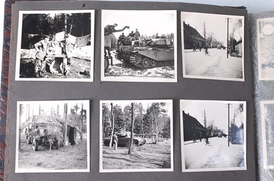 Lot 70 - A post WW II photograph album, the black and...