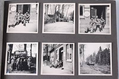 Lot 70 - A post WW II photograph album, the black and...