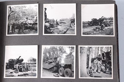 Lot 70 - A post WW II photograph album, the black and...