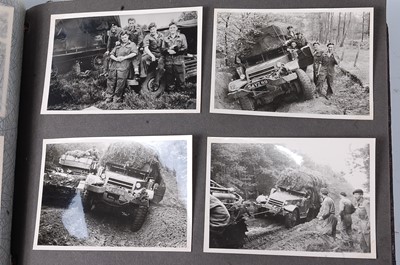 Lot 70 - A post WW II photograph album, the black and...