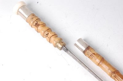 Lot 166 - A late 19th century French bamboo sword stick,...