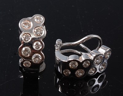 Lot 2207 - A pair of 18ct white gold diamond bubble...