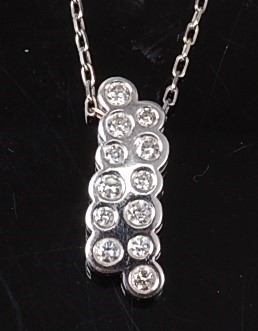 Lot 2267 - An 18ct white gold diamond bubble style...