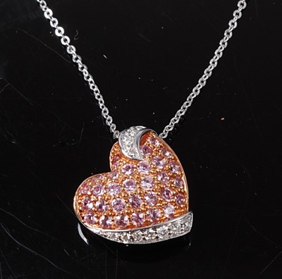 Lot 2246 - A white and rose metal, pink sapphire and...