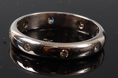Lot 2215 - A 9ct white gold diamond full hoop...