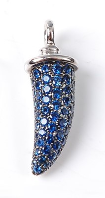 Lot 2270 - An 18ct white gold sapphire horn pendant by...