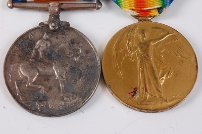 Lot 21 - A WW I British War and Victory pair, naming...