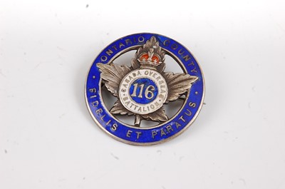 Lot 40 - A WW I silver War Badge, numbered verso 216977,...