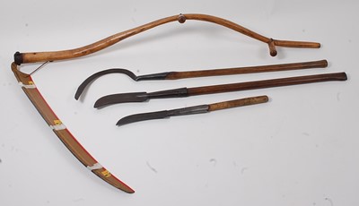 Lot 392 - An American Vestern two handled scythe, having...