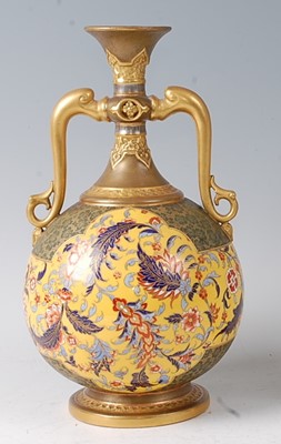 Lot 2039 - A Royal Worcester porcelain twin handled...