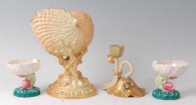 Lot 2042 - A Royal Worcester Nautilus shell, heightened...