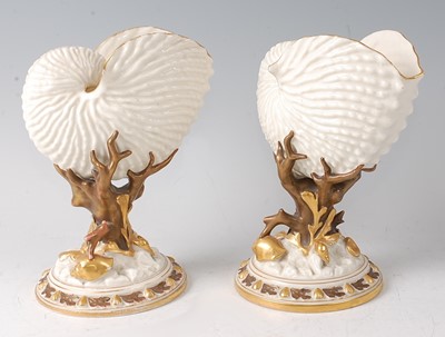 Lot 2051 - A pair of Royal Worcester porcelain Nautilus...