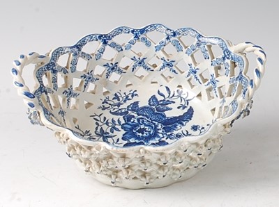 Lot 2054 - A Lowestoft porcelain chestnut basket, circa...
