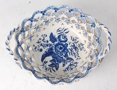 Lot 2055 - A Lowestoft porcelain chestnut basket, circa...