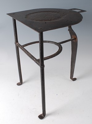 Lot 2346 - A George III steel footman, of good size,...