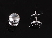 Lot 2261 - A pair of 18ct white gold Louis Vuitton button...