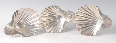 Lot 2126 - A set of three George III silver shell shaped...
