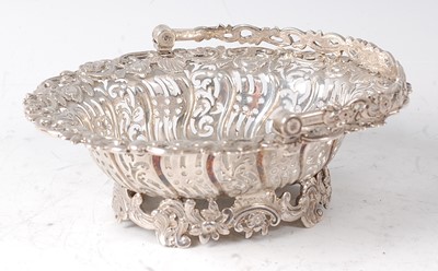 Lot 2133 - A George II silver sweetmeat basket, of shaped...