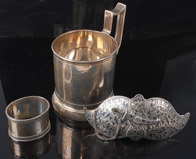 Lot 2149 - A Russian silver mug, bright cut engraved with...