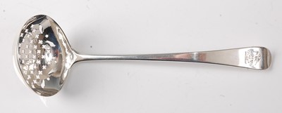 Lot 2193 - A George III silver sifting spoon, in the Old...