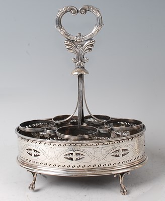 Lot 2171 - A George III white metal cruet stand, of...