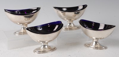 Lot 2173 - A set of four George III silver pedestal table...