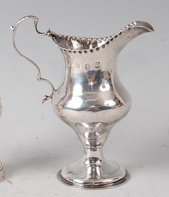 Lot 2177 - A George III silver pedestal cream jug, of...