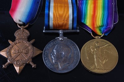 Lot 215 - A WW I trio to include 1914-15 Star, British...