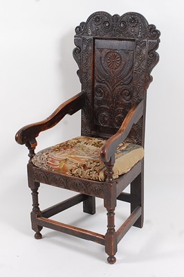 Lot 2496 - An antique oak Wainscot style chair, having a...