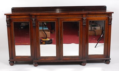 Lot 2517 - A late Regency rosewood breakfront side...