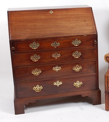 Lot 2524 - A George III mahogany writing bureau, the...