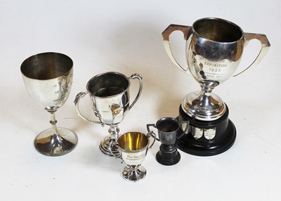 Lot 354 - A George V silver twin handled trophy cup for...