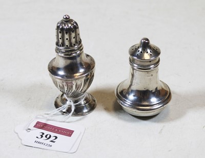 Lot 392 - An Edwardian silver pedestal pepperette, maker...