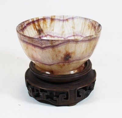 Lot 267 - A blue john style polished hardstone bowl,...