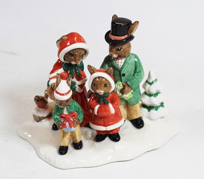 Lot 76 - A Royal Doulton porcelain figure group Merry...