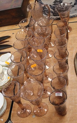 Lot 208 - A 20th century pink tinted glass drinks set (20)