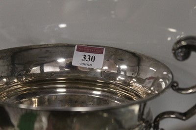 Lot 330 - A silver twin C-scroll handled cup, standing...