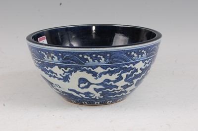 Lot 17 - A Chinese export stoneware bowl having a plain...