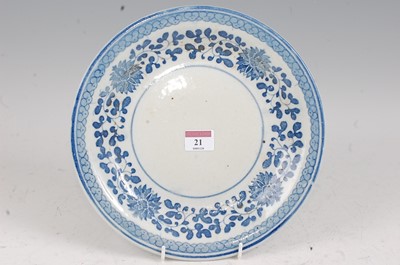 Lot 21 - A Chinese export blue & white plate having...