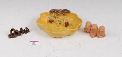 Lot 38 - A small Chinese bronzed brush rest, width 7cm,...