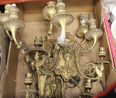 Lot 131 - A pair of Rococo style gilt brass twin sconce...