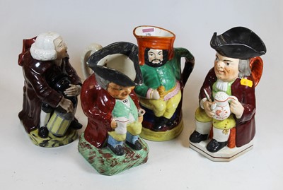 Lot 156 - A 19th century Staffordshire Toby jug, of...