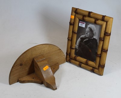 Lot 167 - A monochrome photograph of Queen Victoria,...
