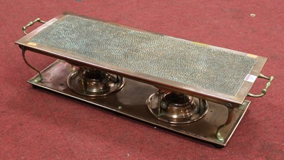 Lot 225 - An early 20th century hammered copper and...