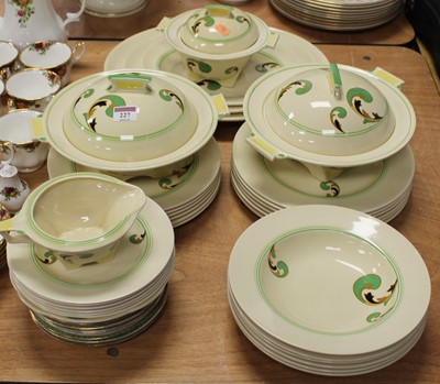 Lot 227 - A Royal Doulton Art Deco part dinner service...