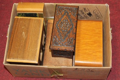 Lot 242 - A musical box in the form of a carved oak...