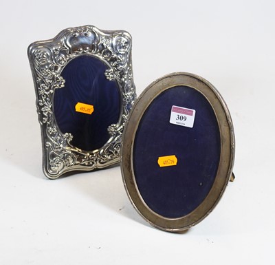Lot 309 - An Edwardian silver clad easel photograph...